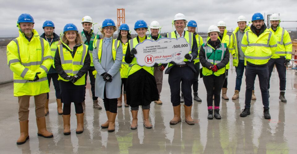 BAM Construction, NWAA, NCA and HELP with a cheque for £500,000