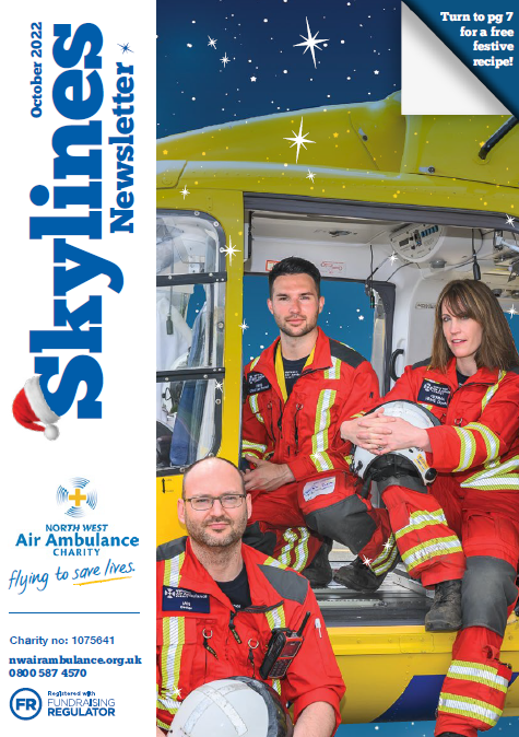 The front cover of our October 2022 edition of Skylines, featuring a picture of three HEMS paramedics and doctors inside a helicopter