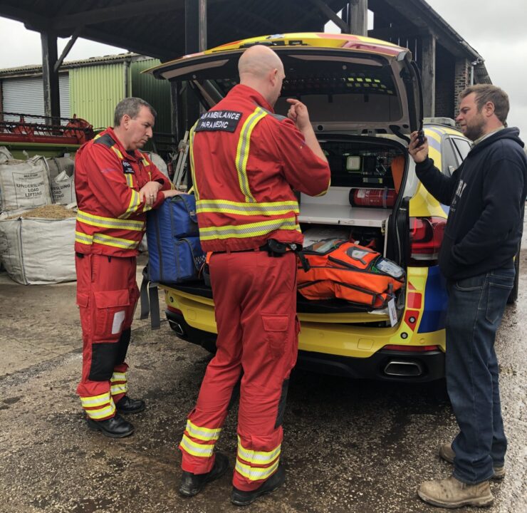 Crew showing olly the critical care vehicle
