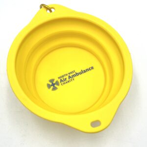 Small yellow, plastic bowl with a carabiner, a strong metal loop for attaching items.