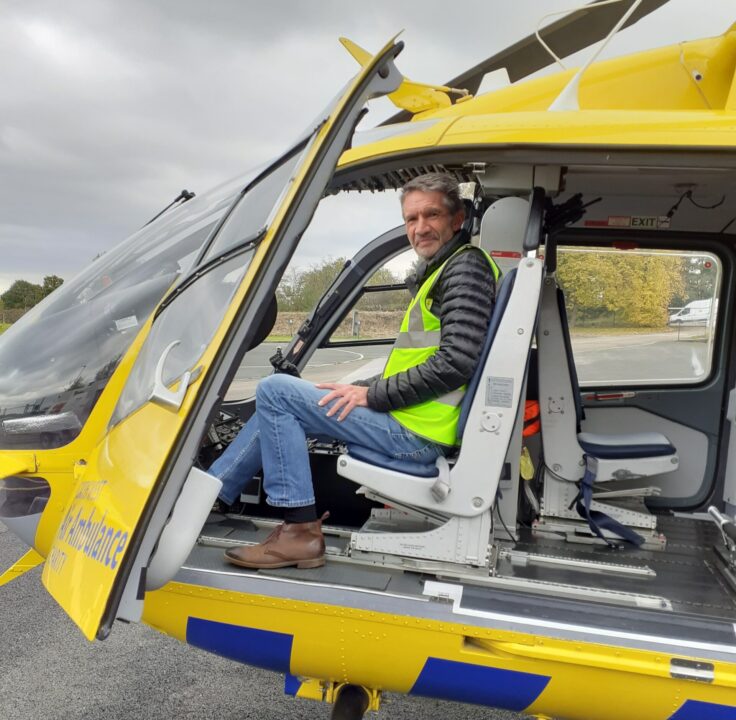 Jon in the yellow and blue helicopter from the North West air ambulance charity