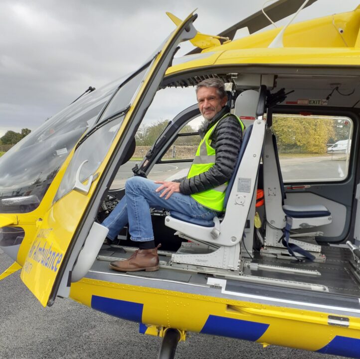 Jon in the yellow and blue helicopter from the North West air ambulance charity