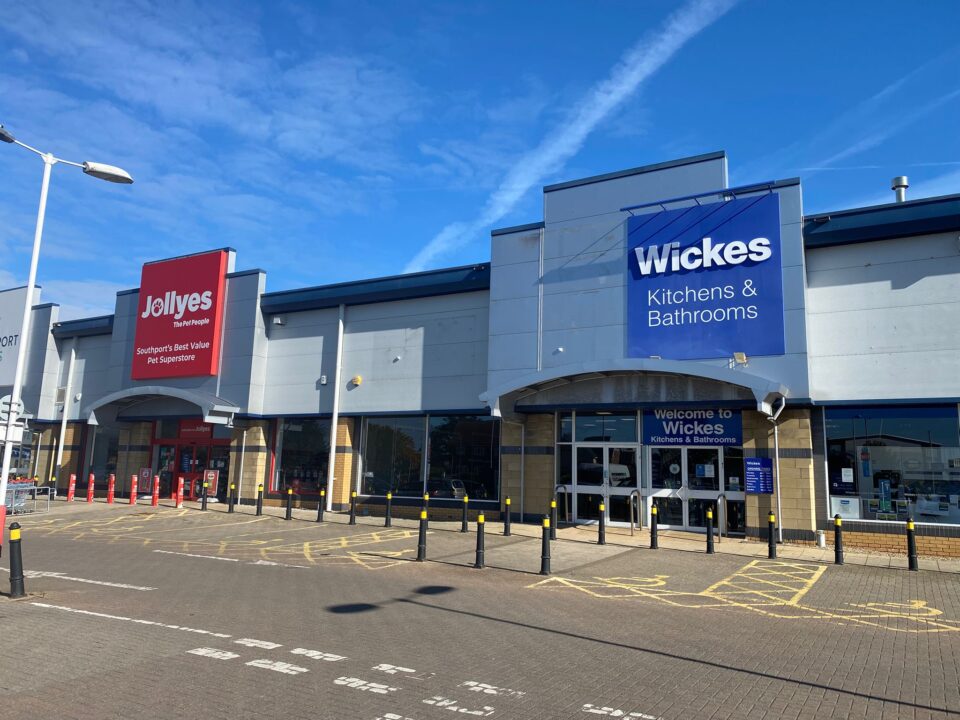 “A retail park with the Jolleyes pet superstore on the left and Wickes Kitchens & Bathrooms on the right. The new superstore will be situated between these two stores.”
